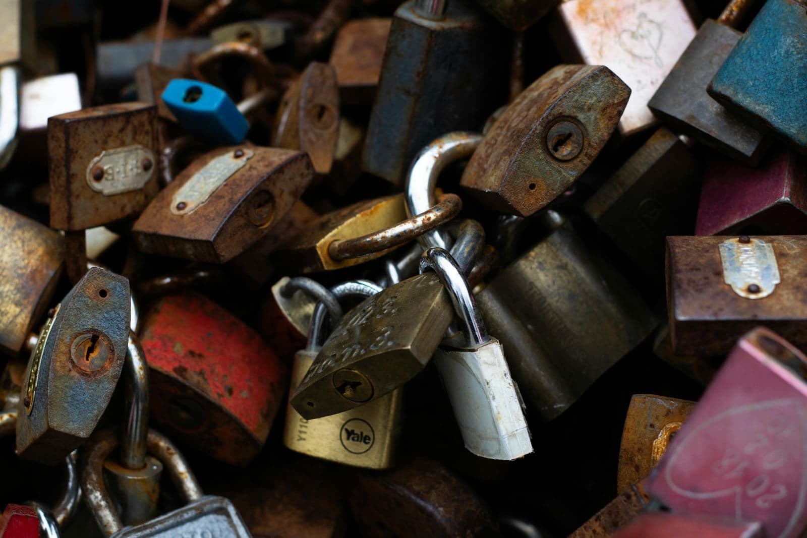 A pile of old padlocks and keys of different shapes, standing in for the range of mcp authentication patterns in use and how differently each one actually locks