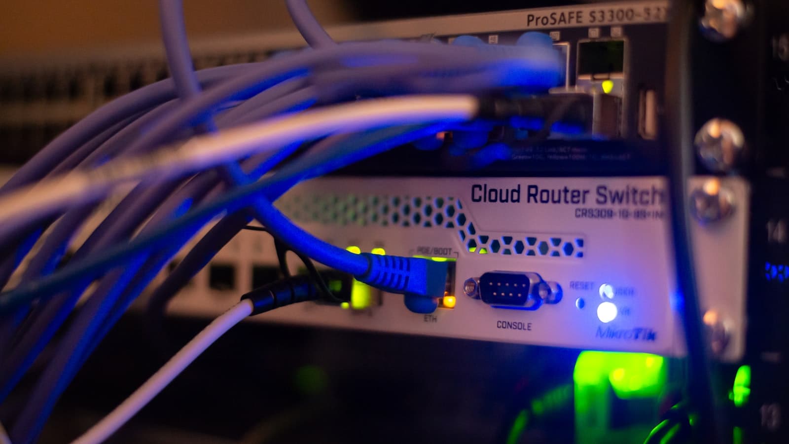 Ethernet cables plugged into a network switch, standing in for the many mcp security boundaries an agent's tool calls cross before a request is answered