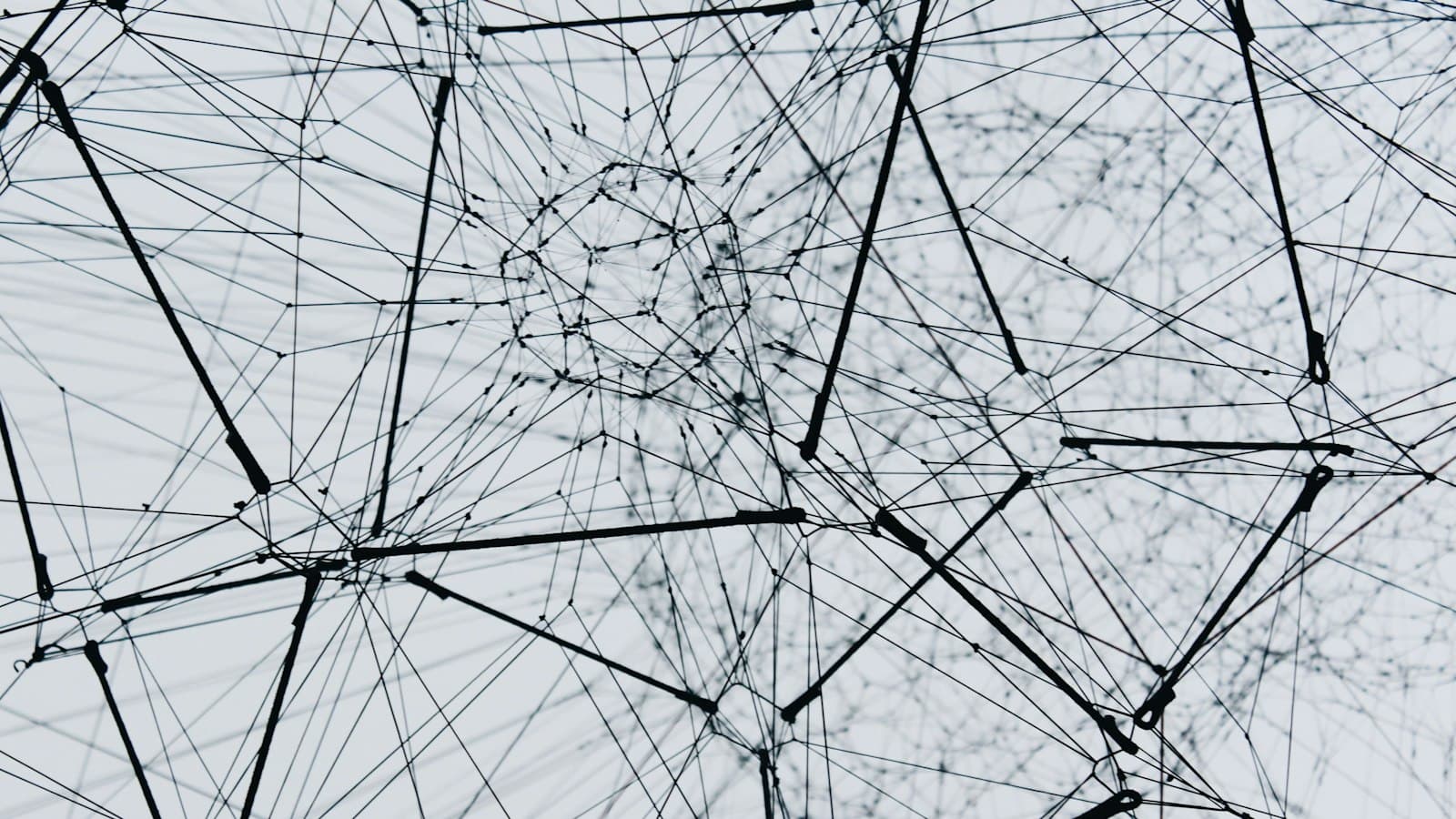 Mem0 vs Zep illustrated by an abstract network of connected nodes and lines, standing in for the vector memory and temporal knowledge graph each tool is built on