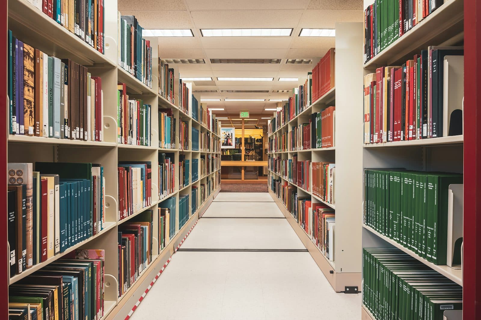 Rows of archive shelving stretching into the distance, standing in for the layered storage an agent memory framework organises facts into
